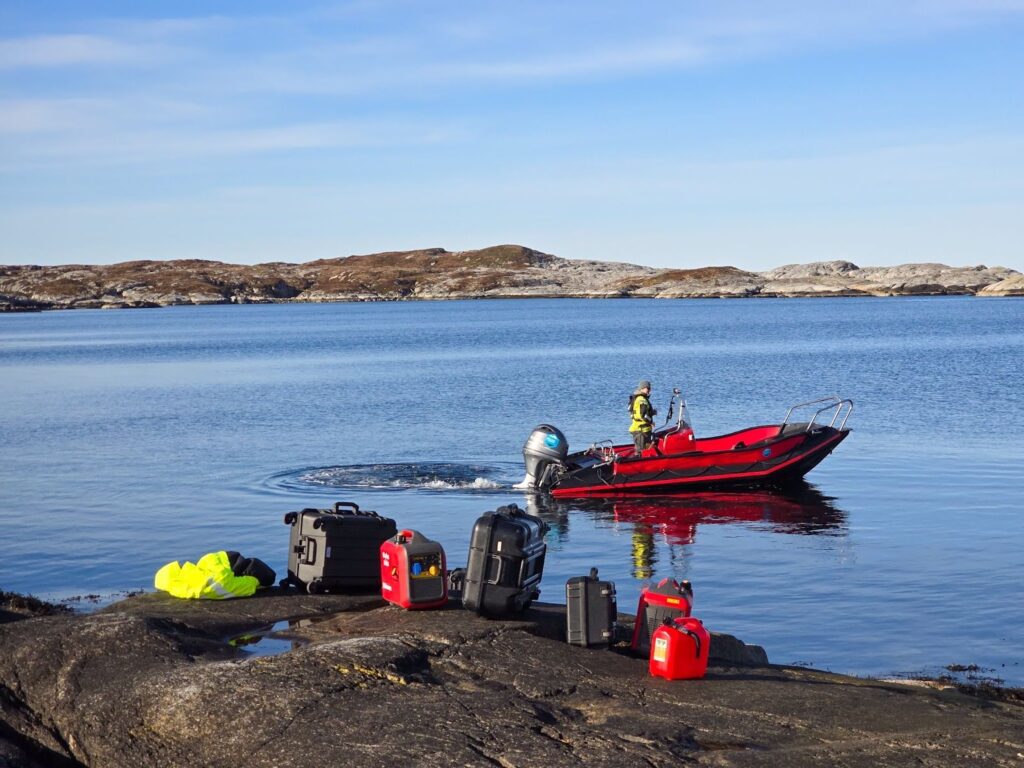 Drone equipment being dropped off by boat.