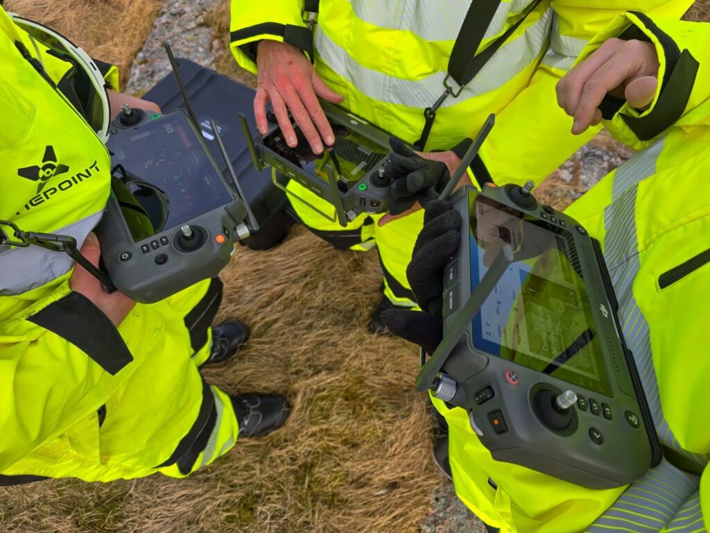 Pilots planning routes before flight.